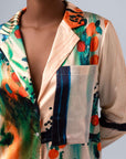 Close-up of the Les Orangers shirt vest with multicolor floral print and structured design features.